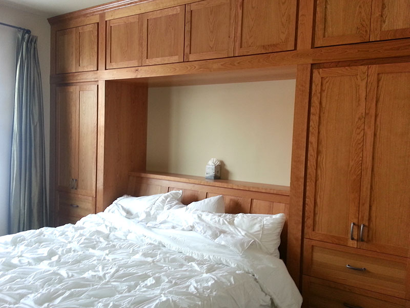Custom wooden bedroom cabinetry